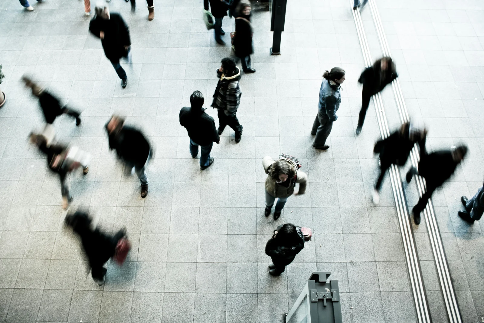 Commuters crossing a public square